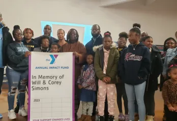 Family members with a banner