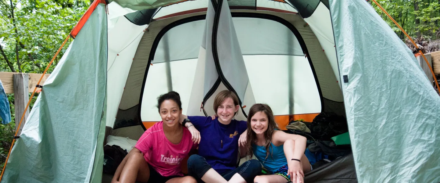 Girls in a camping tent