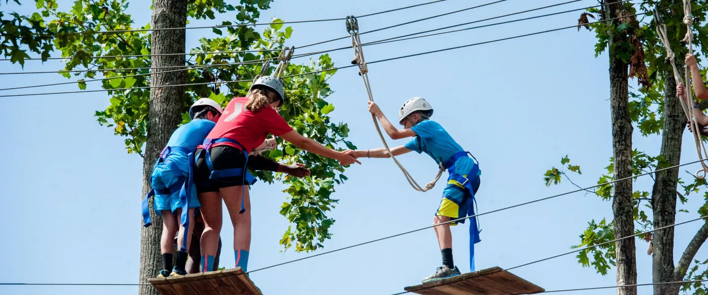 Kids on high ropes at Camp Hanes