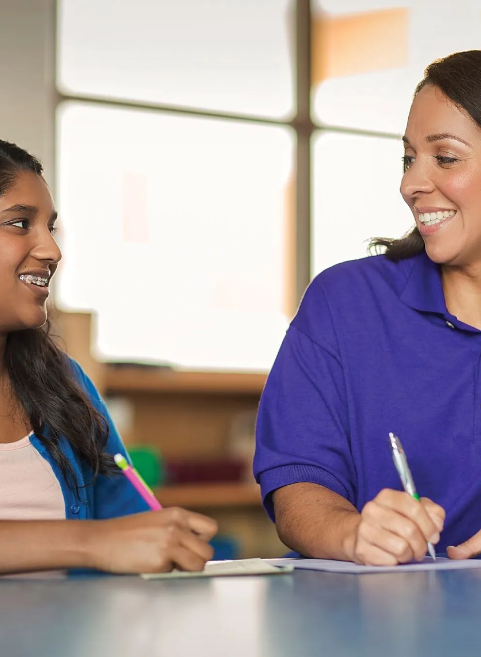 YMCA employee teaching student