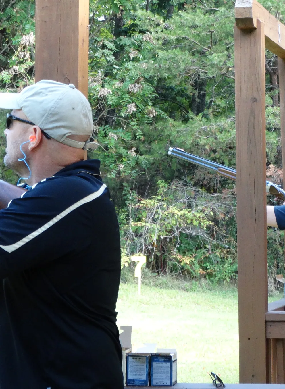 Adults shooting clays