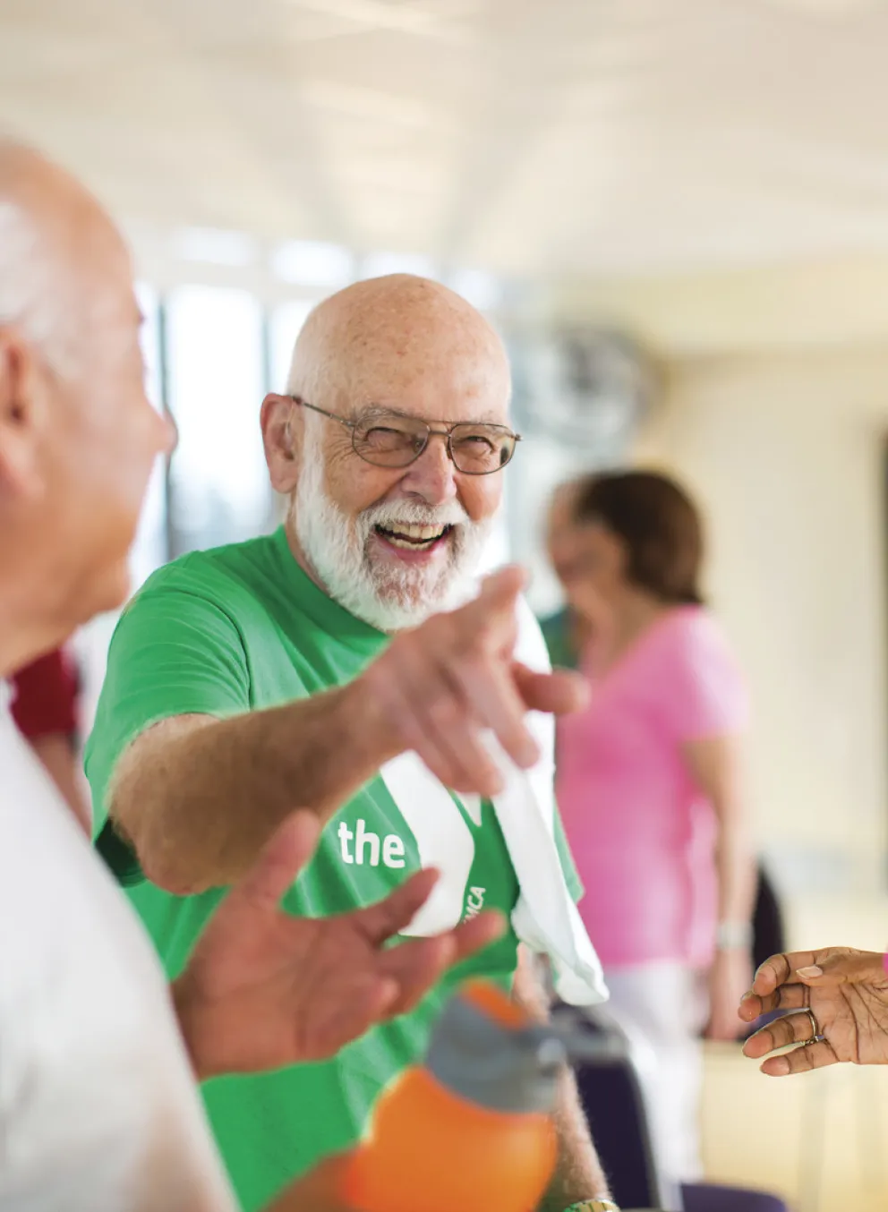 Three older adults smiling