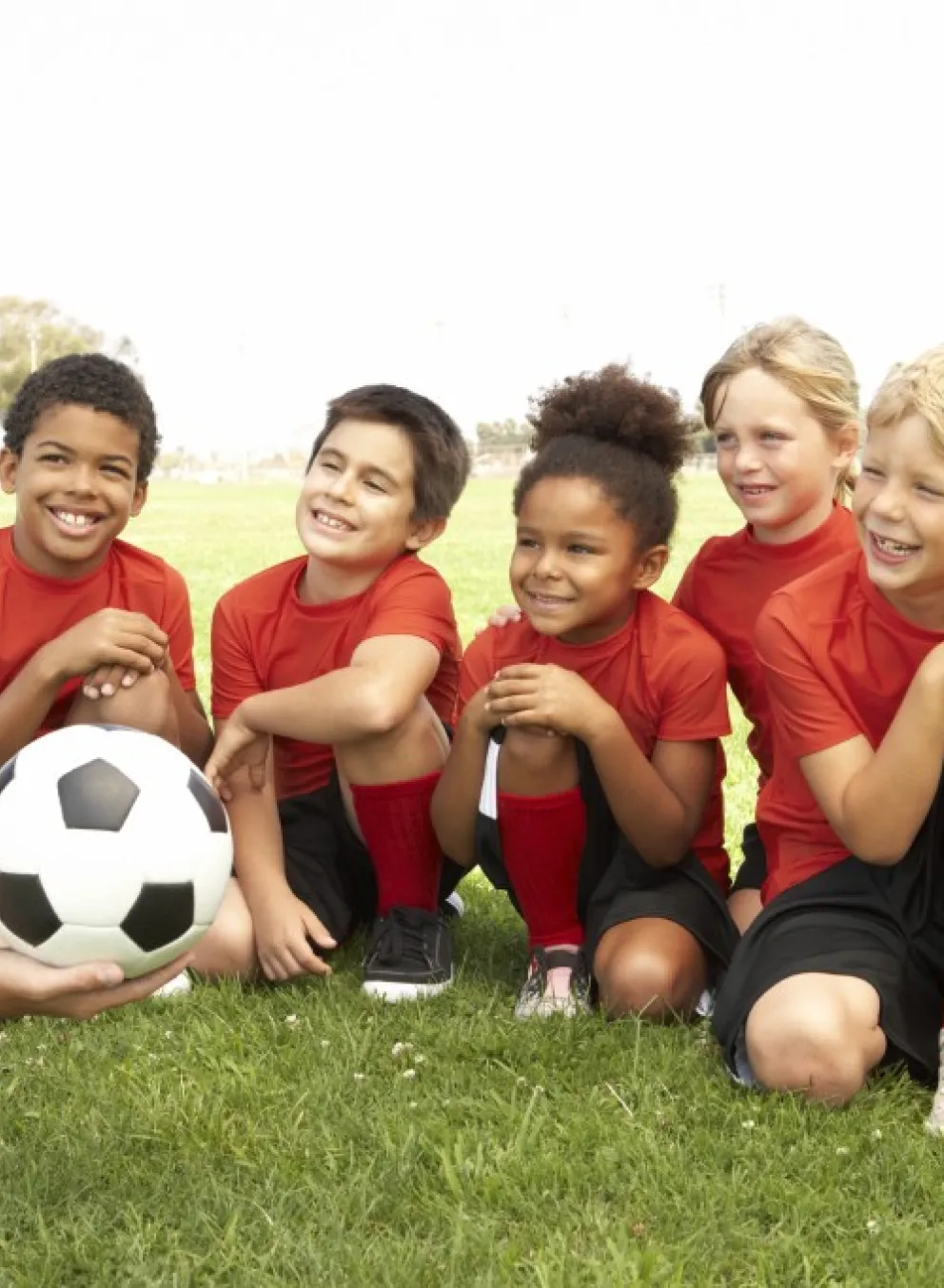 Soccer team with their coach
