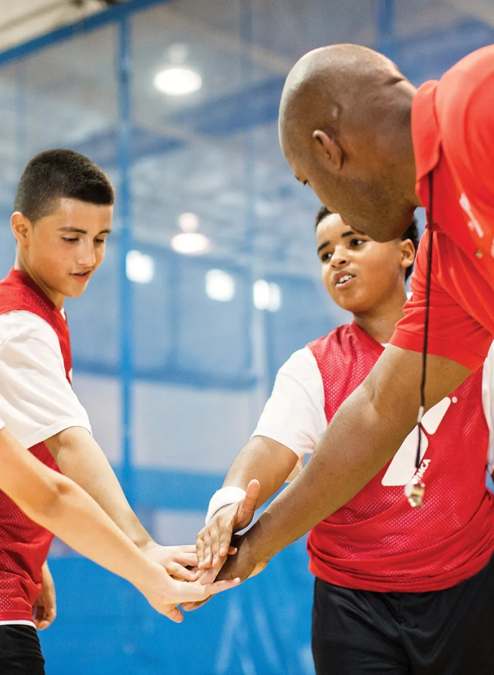 Basketball team and coach