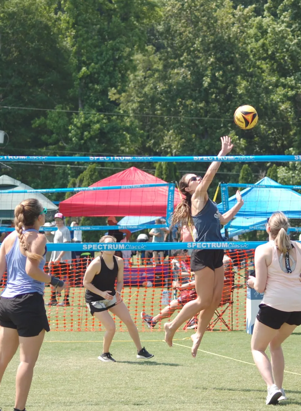 Women playing volleyball