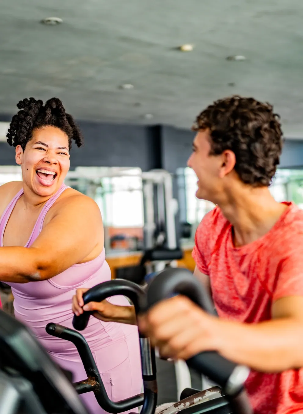 people on exercise equipment