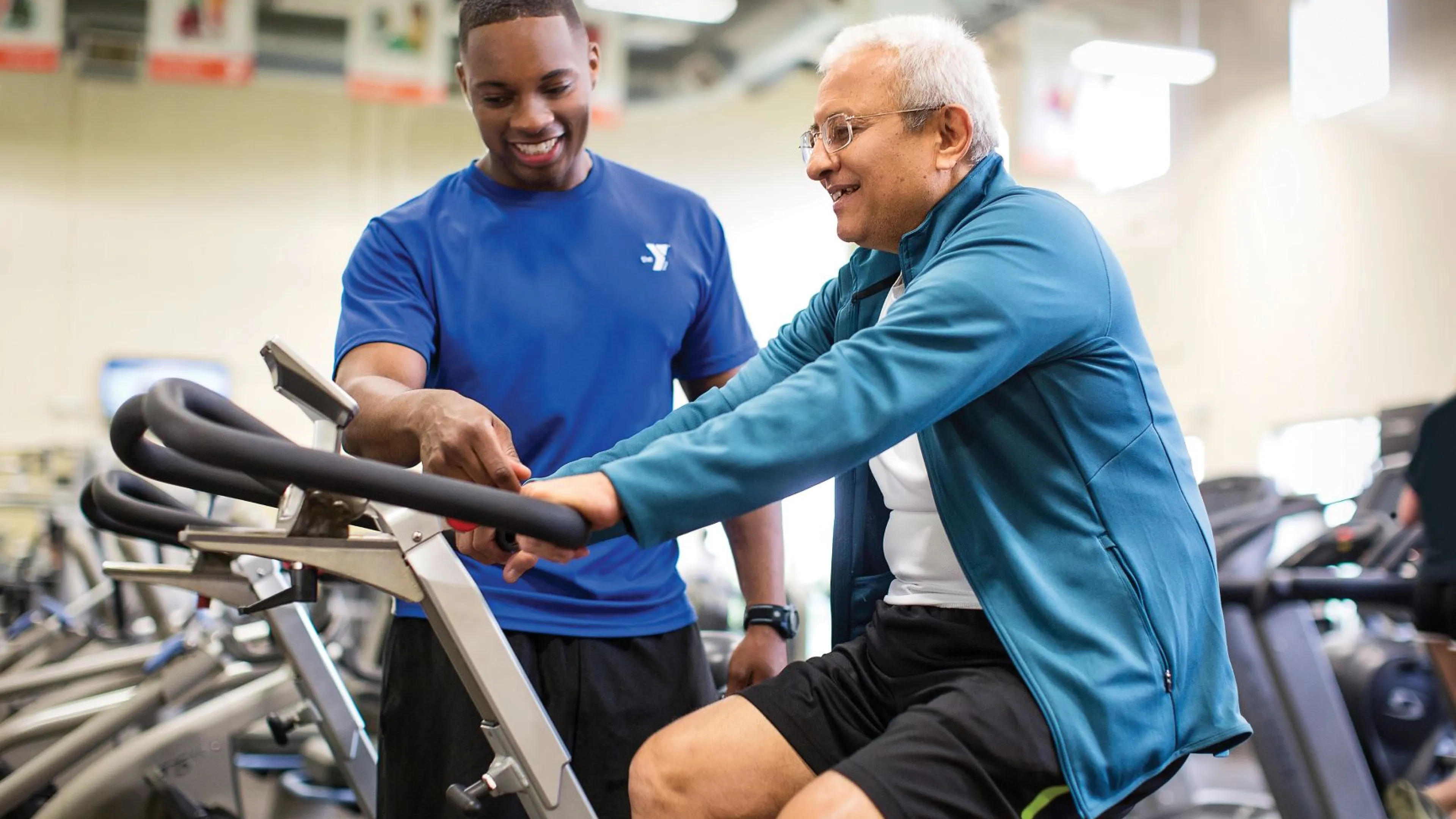 active older adult exercising on a cycle
