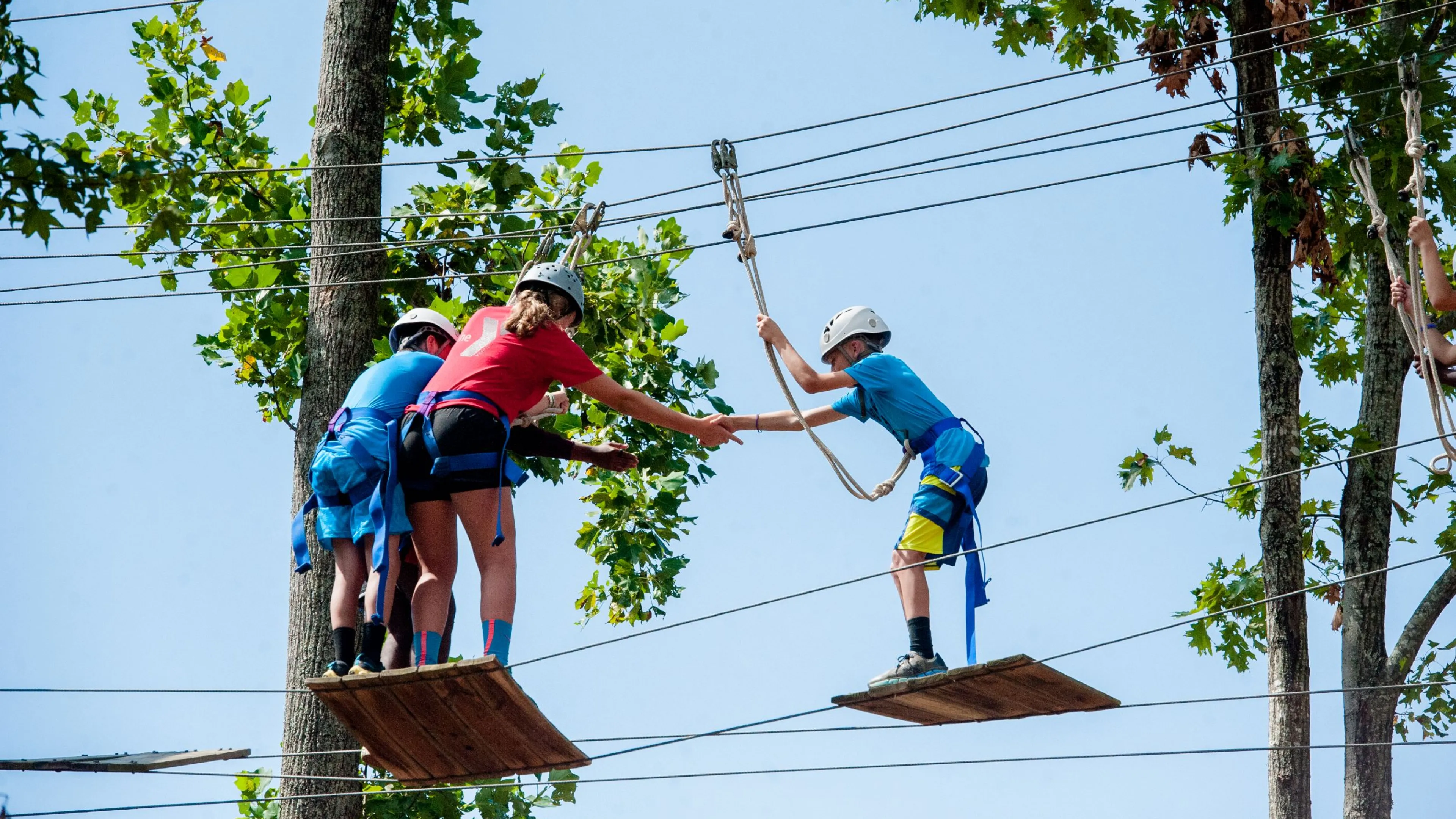 Kids on high ropes at Camp Hanes