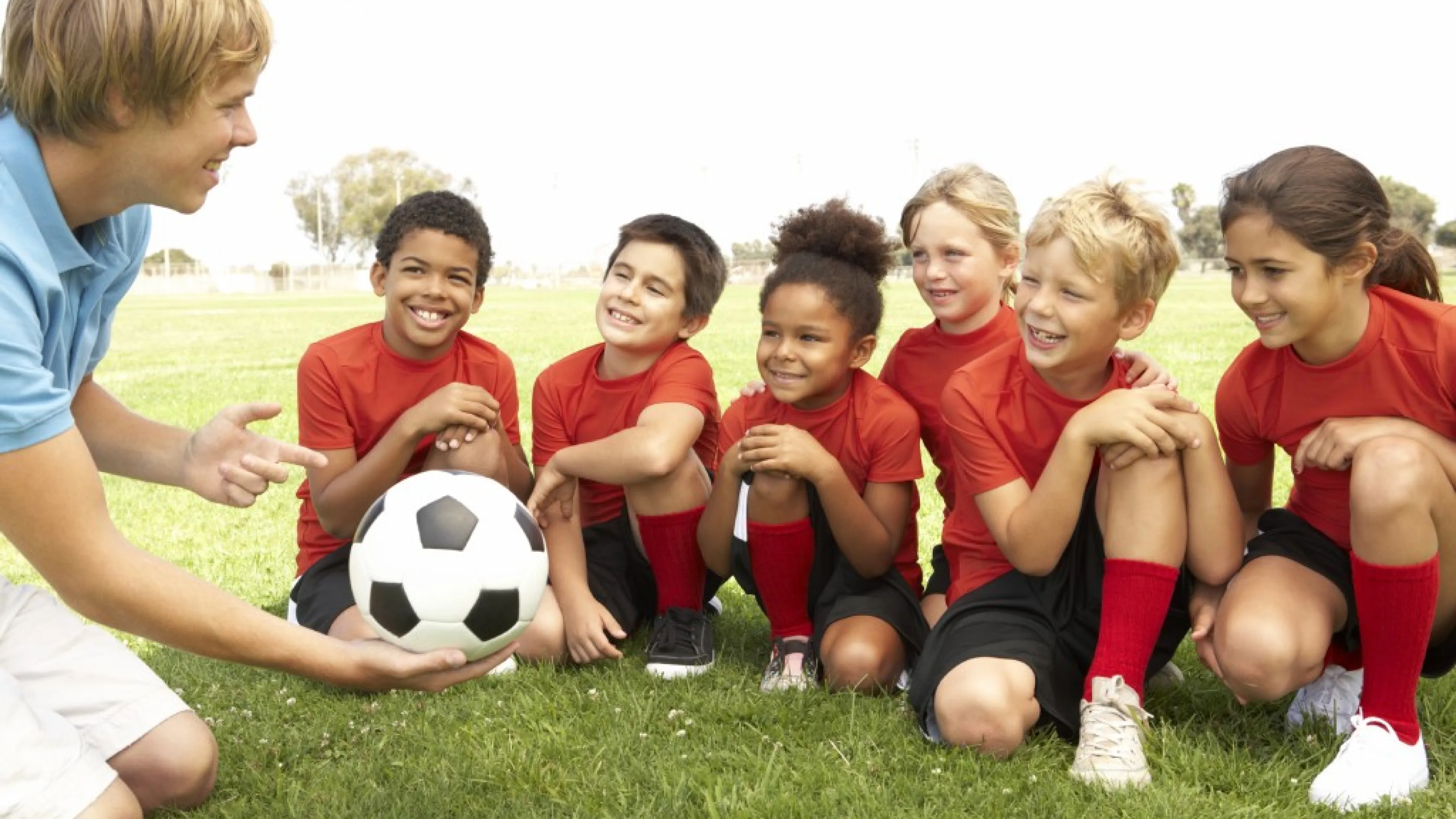 Soccer team with their coach