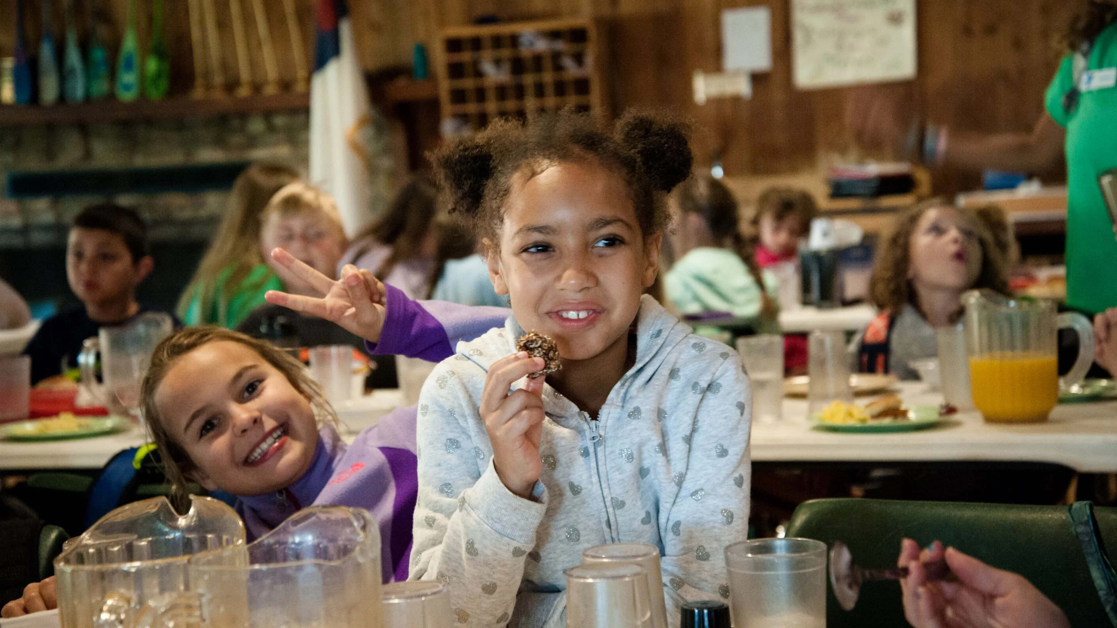 Girls eating cookies at Camp Hanes winter camp