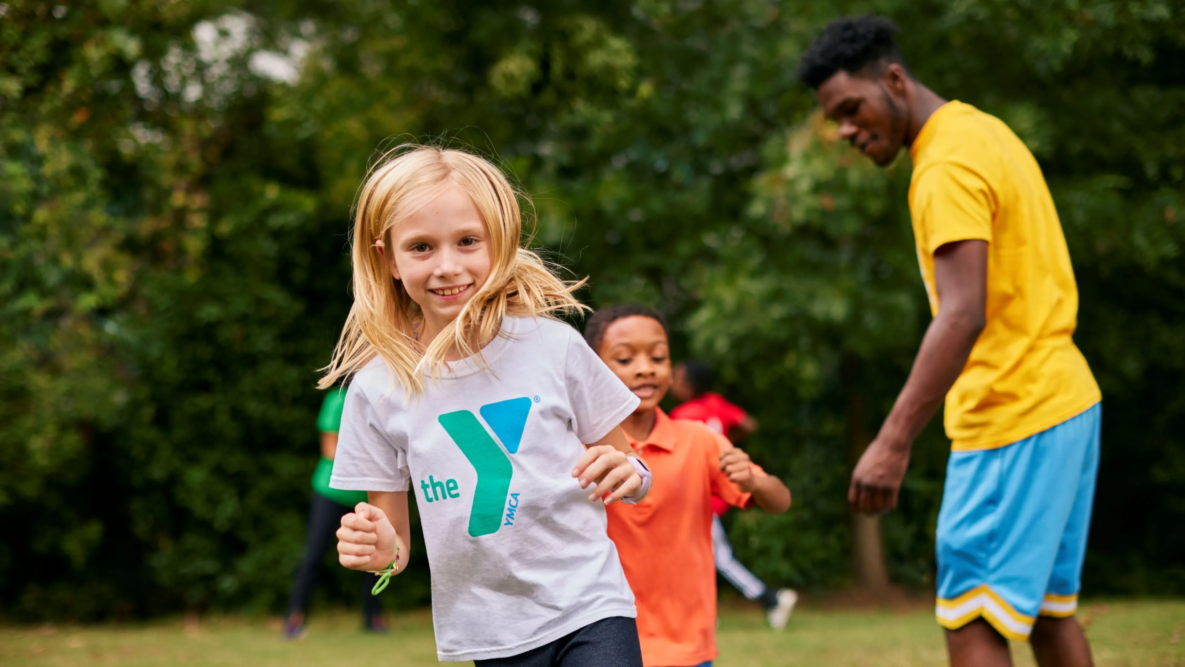 Smiling girl playing outside