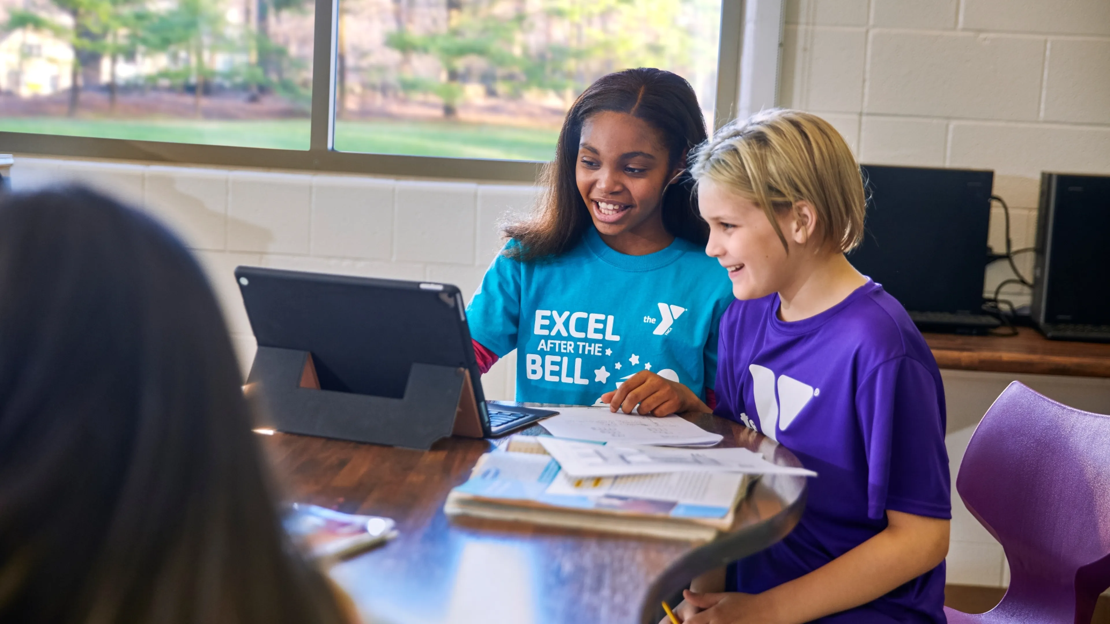 Two students on a computer