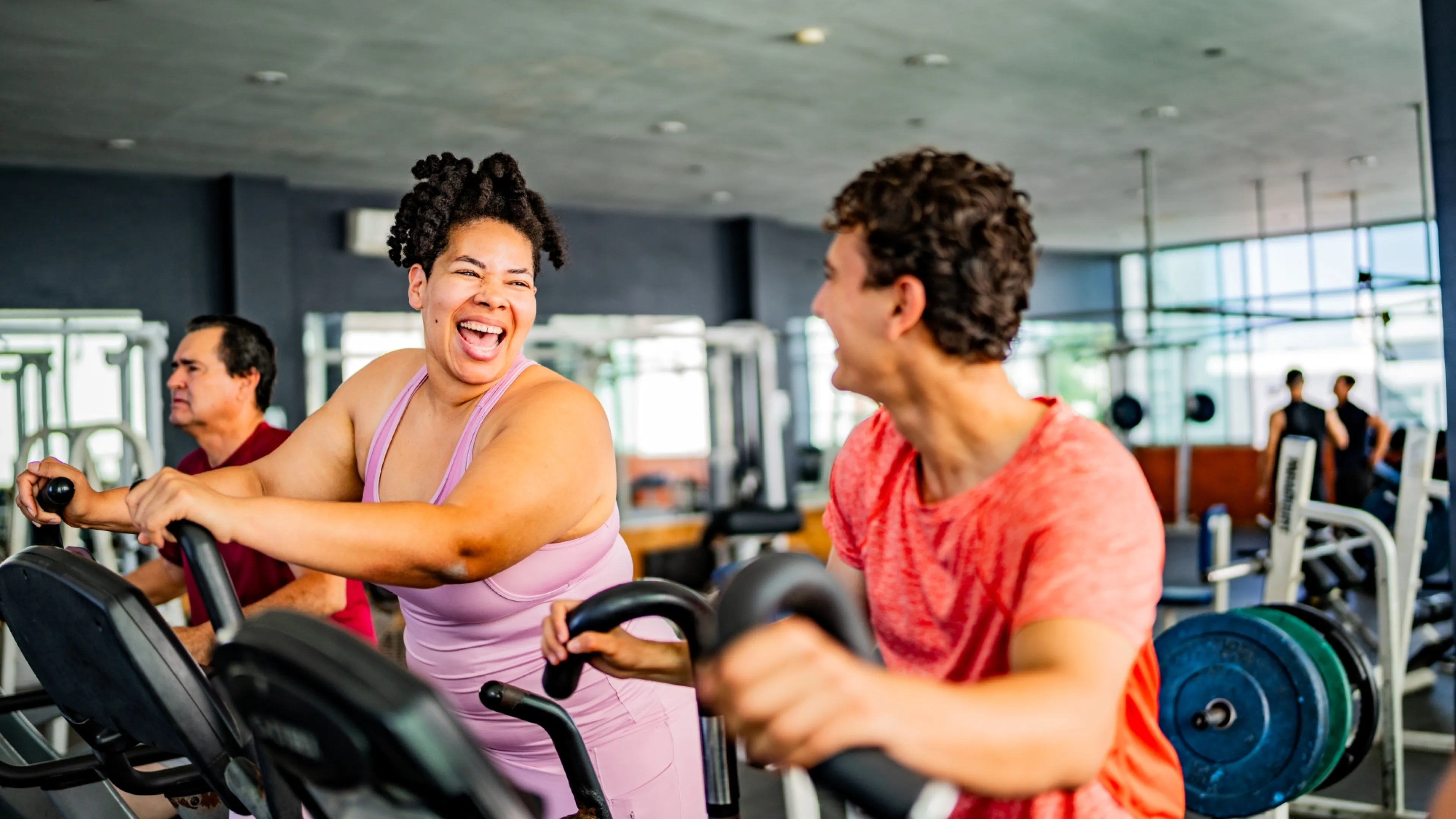 people on exercise equipment