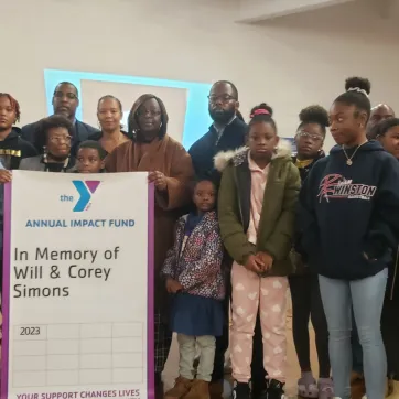 Family members with a banner