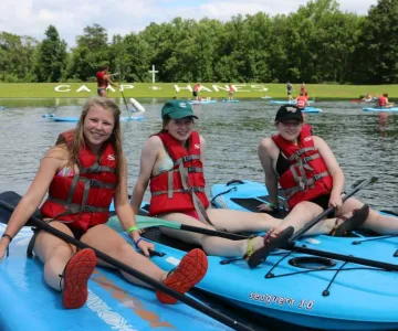 Girls on paddleboards at Camp Hanes