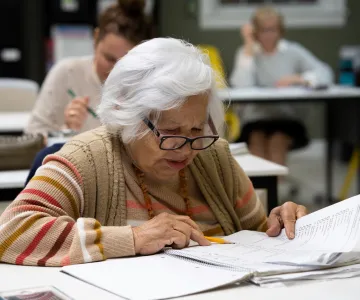 Older woman studying