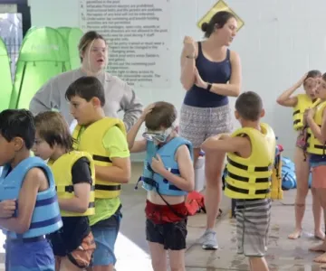 Kids in life jackets