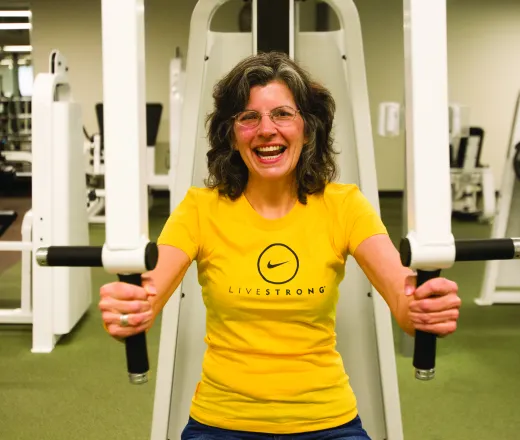 Woman working out with LIVESTRONG shirt