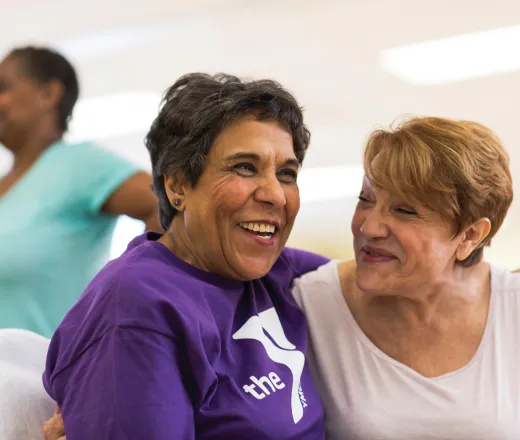 Two adult women smiling