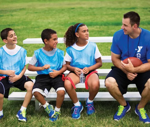 Flag football team and coach