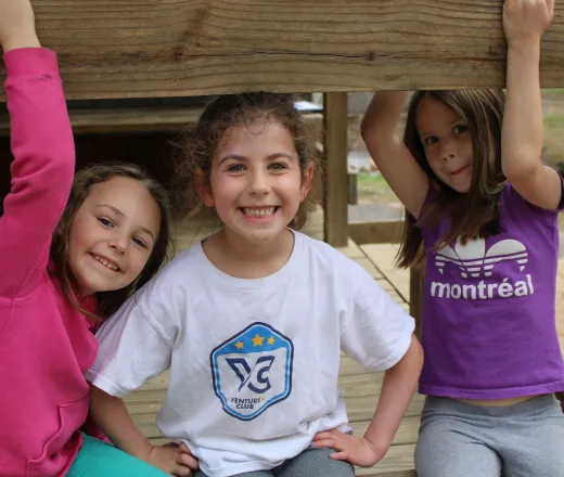 3 young girls sitting together