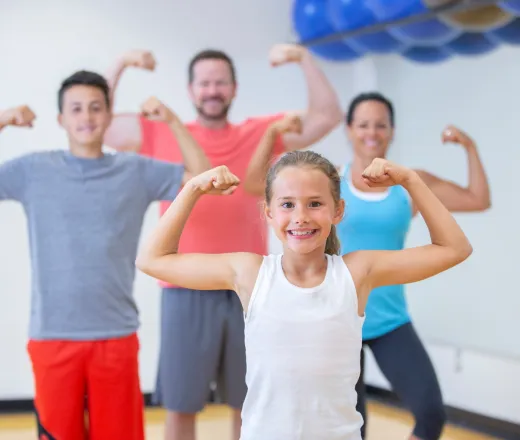 family showing off their muscles