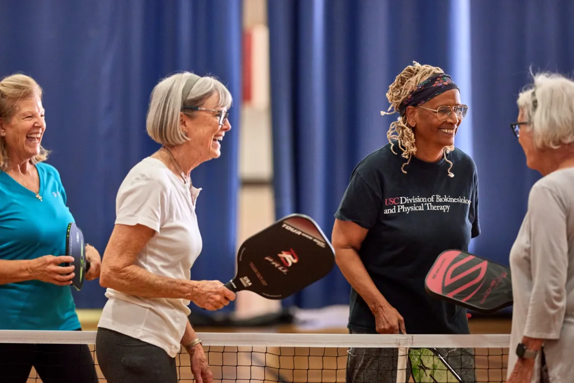Group of ladies playing pickleball