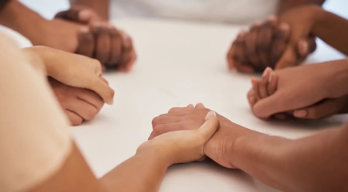 Hands praying