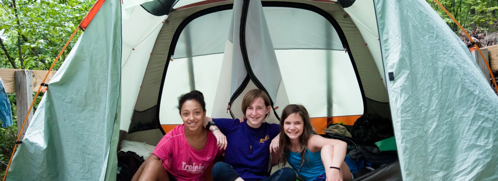 Girls in a camping tent