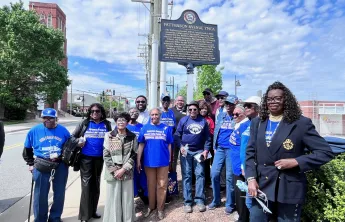 patterson ave YMCA committee with historic marker