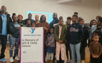 Family members with a banner