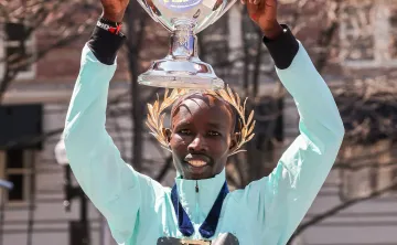 John Korir with Boston Marathon trophy